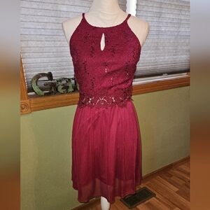 A.Byer size 9 red halter next dress with sequins.